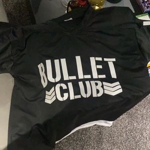 Brand new bullet club jersey signed by Kenny omega. Jsa certified.